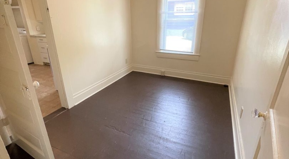 Available NOW for short-term lease only...Incredible location on Cameron Ave. 2 BR + 2 bonus rooms + parking, just blocks to UNC or Franklin St. - Includes water & sewer!