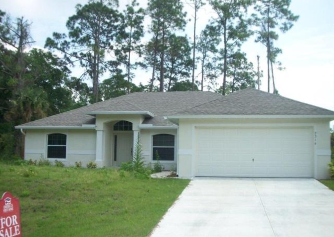 Houses Near 4BR / 2BA Single Family House with Attached Garage