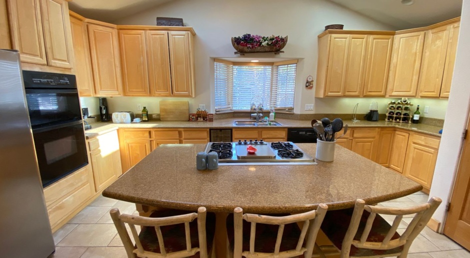 Gorgeous furnished 3 Bedroom w Garage in Gated Community!  Next door to Lake Tahoe School.