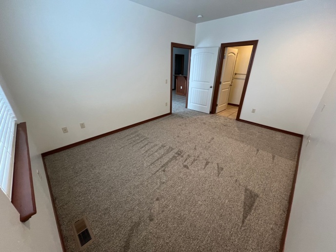 Spacious townhome! Family room, central heat & air, double garage and VIEWS!!! New carpet & paint!