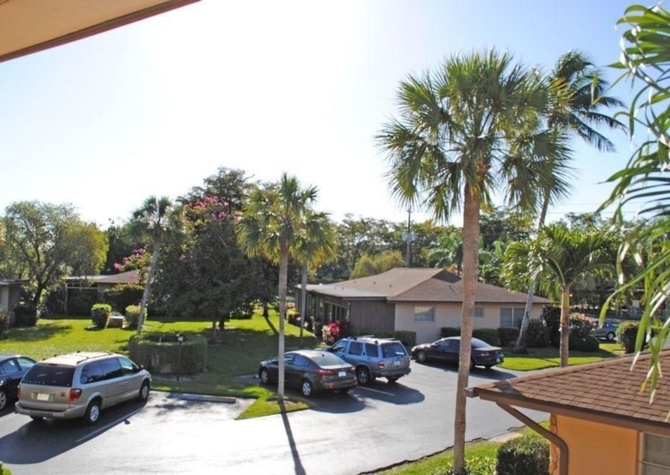 Houses Near ** ADORABLE 2ND FLOOR 2/2 CONDO CANAL VIEW IN FABULOUS NORTH NAPLES**