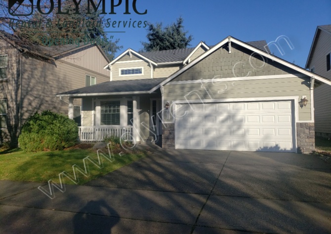 Houses Near Wood flooring thoughout! 4 bdrm in Olympia School District.